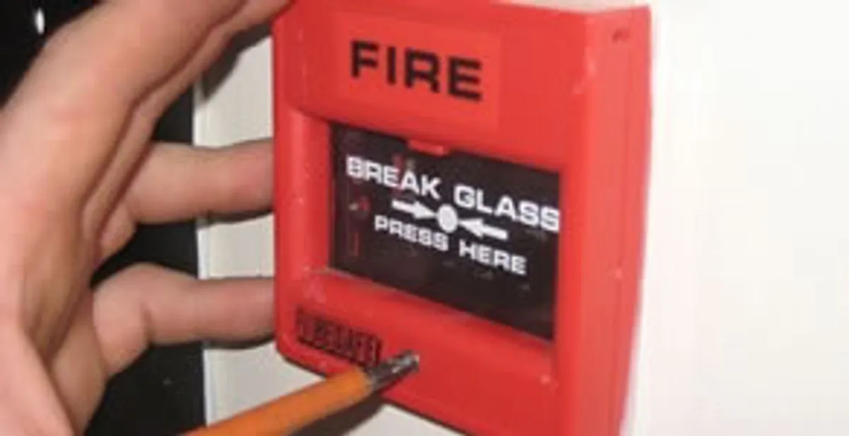 fire alarm installation service showing manual fire alarm pull station installed by licensed electricians in Ogden, UT