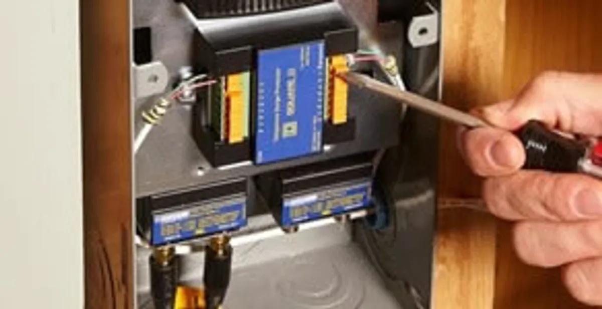 Whole home surge protection device being installed by a licensed electrician to protect electrical systems in Ogden, UT